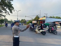 Satuan Lantas Polres lamandau Laksanakan Pengaturan Lalin Pada Pagi hari
