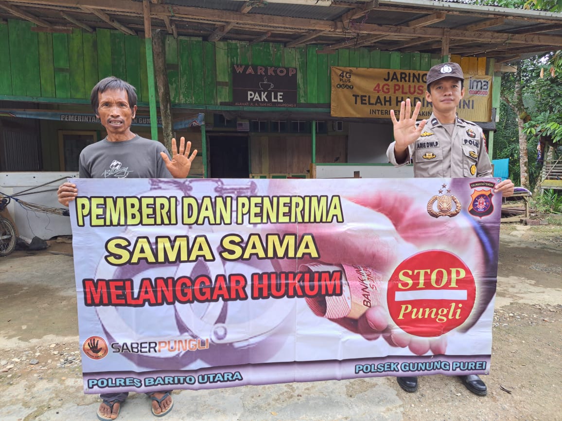 Polsek Gunung Purei Sosialisasikan Saber Pungli kepada Pedagang Pasar dan UMKM