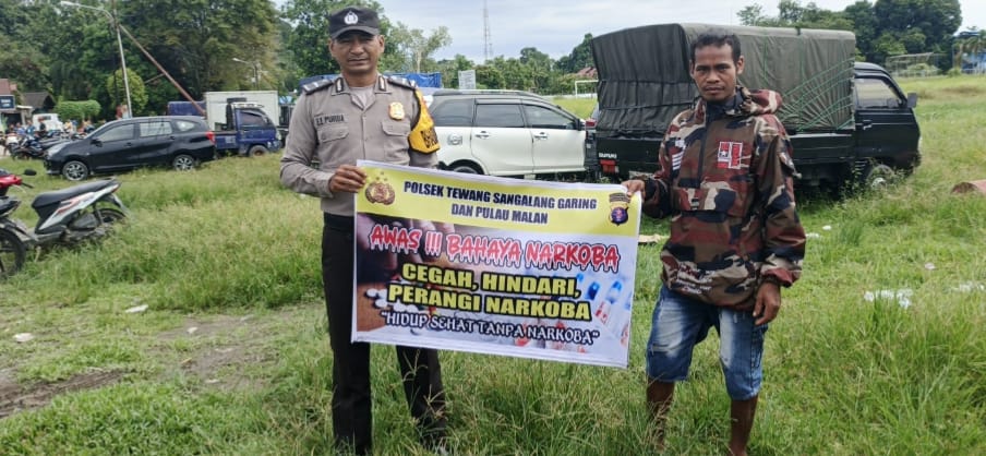 ‎Melalui Media Spanduk, Polsek Tewang Sangalang Garing dan Pulau Malan Imbau Warga Tidak Terjerumus  Penyalahgunaan Narkoba.